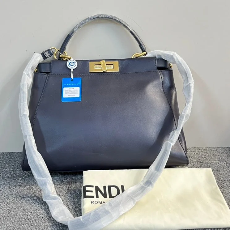 Fendi bags with a magnetic - closure card holder inside for easy access to cardsFendi Black Peekaboo Bag with Gold Hardware Large