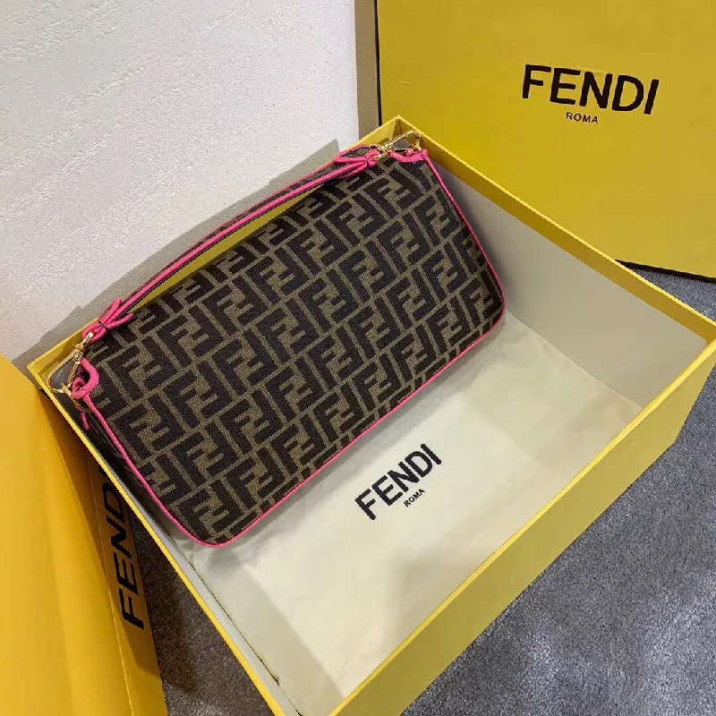 Fendi crossbody bags with a keychain holder for practicality and easy access to keysFendi Baguette Large Bag In FF Fabric With Pink Trim