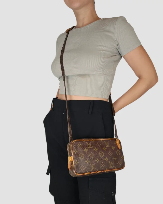 Ladies Louis Vuitton handbags with a detachable coin purse insideLouis Vuitton Pochette Marly Bandouliere