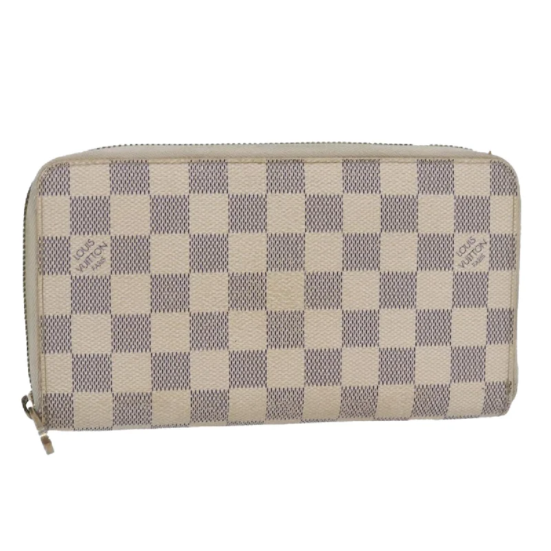 Louis Vuitton Speedy bags in monogram canvas for a classic lookLOUIS VUITTON Portefeuille zippy Wallet