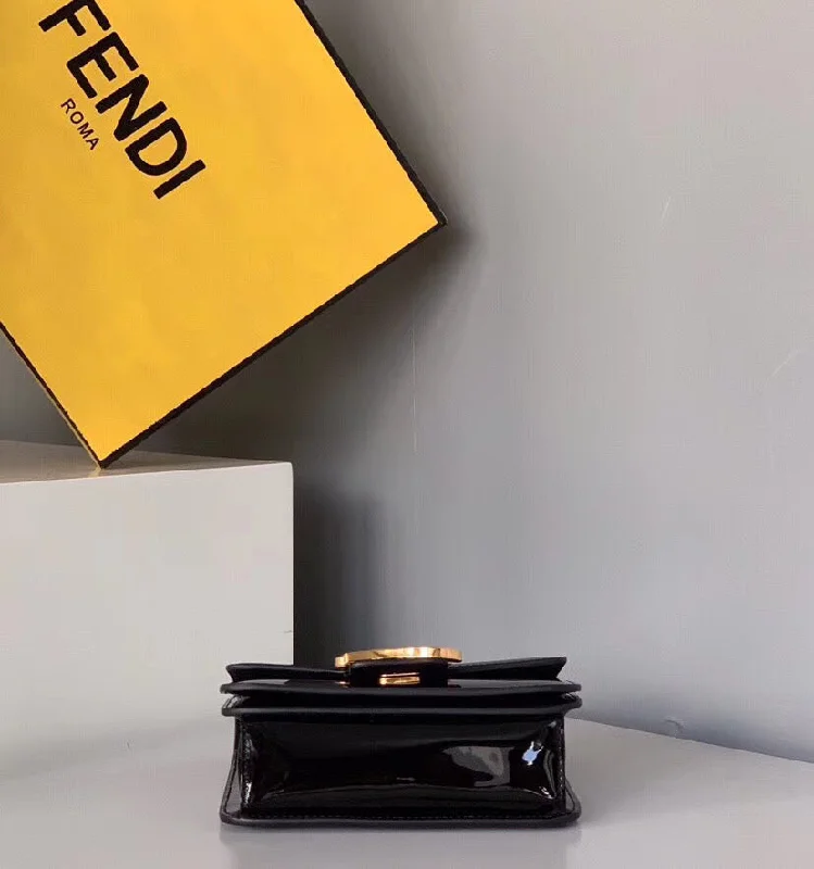 Fendi Sunshine Shopper bags with a removable interior organizer for customized storageFendi Karligraphy Bag In Black Patent Leather