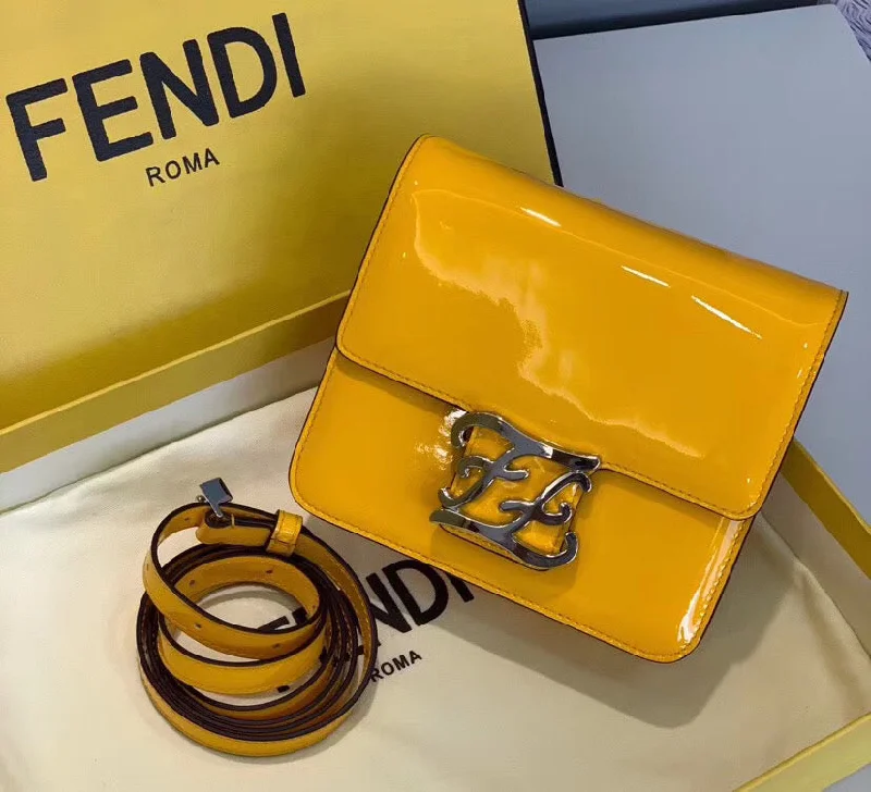 Ladies Fendi Peekaboo bags with a textured leather surface for a more tactile and luxurious feelFendi Karligraphy Bag In Yellow Patent Leather