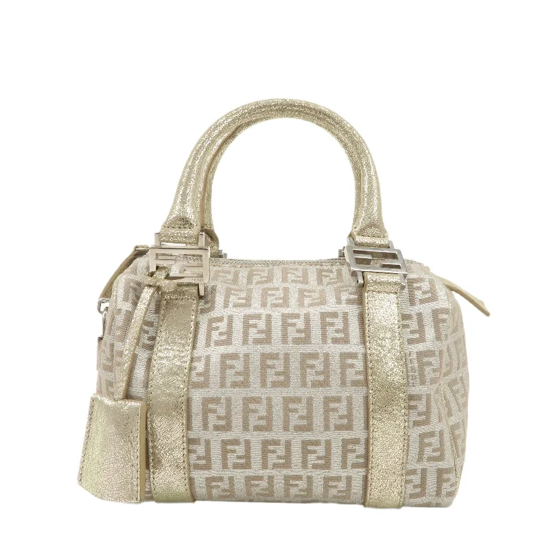 Fendi tote bags with a spacious interior and multiple pockets for daily essentialsFENDI Zucchino Canvas Leather Mini Boston Bag Gold 8BL071