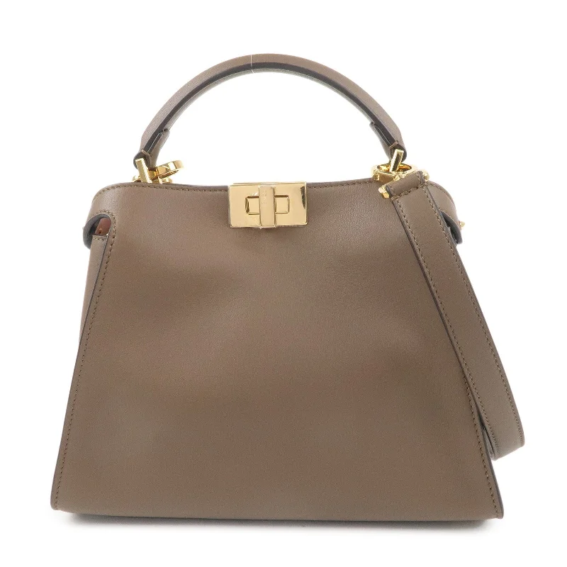 Fendi By The Way bags with a suede interior lining for a luxurious and soft feelFENDI Leather Peekaboo Iconic Essentially 2Way Bag Brown 8BN302