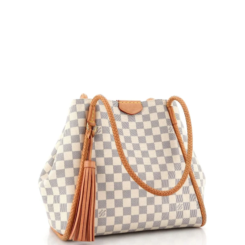 Ladies Louis Vuitton Petite Malle bags in a pastel color for a soft lookLouis Vuitton Propriano Handbag Damier