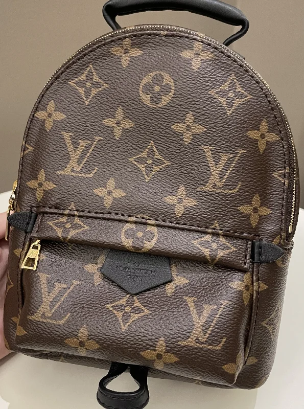 Louis Vuitton Twist bags with the iconic LV - turnlock closureLouis Vuitton Palm Spring Mini Backpack Classic Monogram