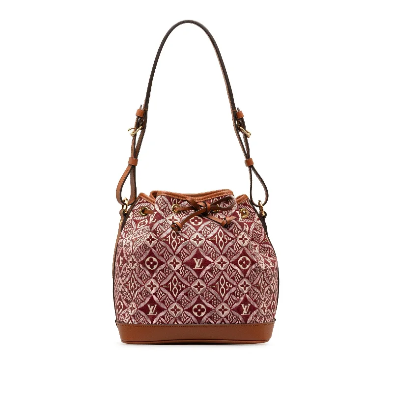 Louis Vuitton crossbody bags with a printed floral pattern for femininityLouis Vuitton Noe Brown Since 1854 Canvas