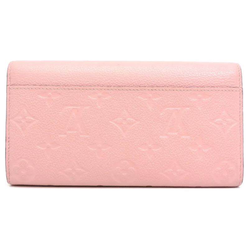 Louis Vuitton Alma bags with a monogram - embossed leather surfaceLOUIS VUITTON Portefeuille Sarah Women's Long Wallet M64082 Monogram Empreinte Rose Poudre/Pink