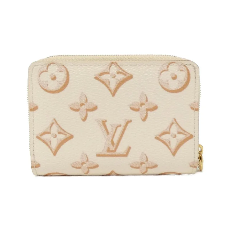 Louis Vuitton Twist bags with the iconic LV - turnlock closureLouis Vuitton Portefolio M81527 Wallet