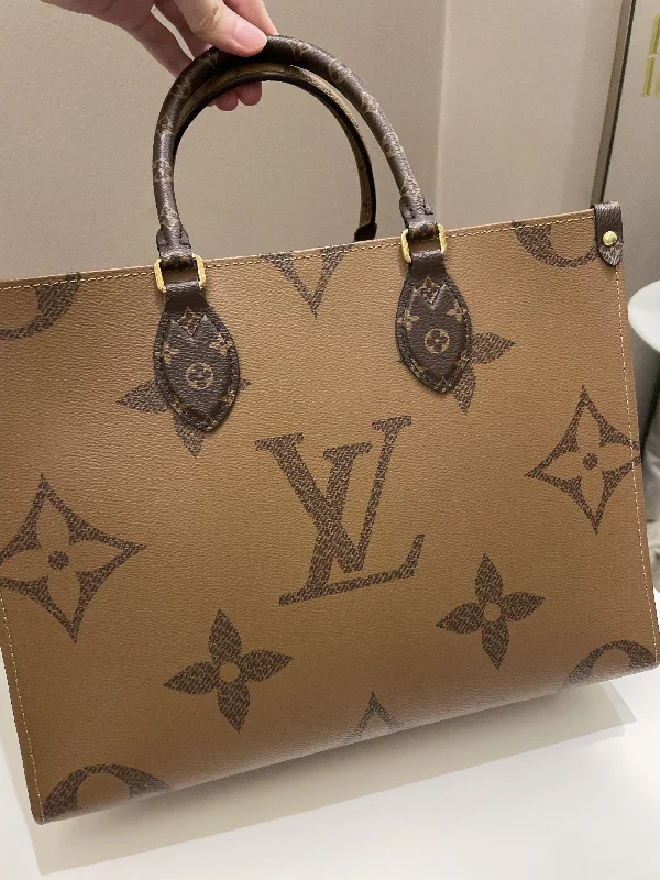 Louis Vuitton bags with a snap - button closure and a decorative charm for styleLouis Vuitton Onthego Tote MM Reversed Monogram