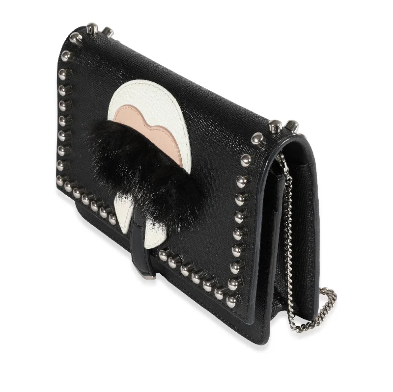 Ladies Fendi Peekaboo bags with a detachable shoulder strap for different carrying optionsFendi Black Vitello Elite & Mink Studded Karlito Chain Wallet