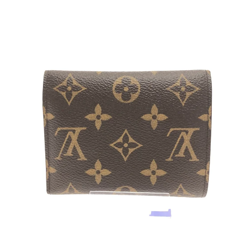 Louis Vuitton Twist bags with a snakeskin - effect panel for a bold lookLouis Vuitton Portefeuille Victorine