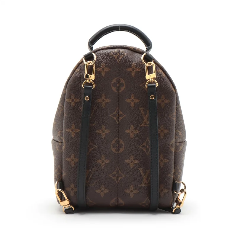 Ladies Louis Vuitton handbags with a detachable coin purse insideLOUIS VUITTON Palm Springs Mini in Monogram M44873