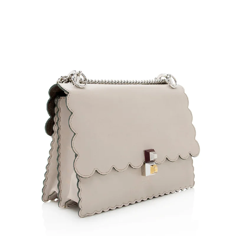 Fendi By The Way bags with a large capacity and a drawstring closureFendi Calfskin Studded Kan I Medium Shoulder Bag (SHF-19206)