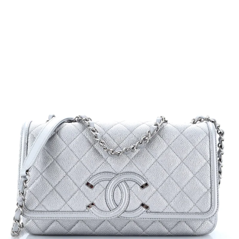 Chanel bags with iconic stitching detailsFiligree Flap Bag Quilted Caviar Medium